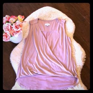 Rose colored sleeveless top.